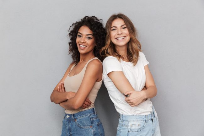 Portrait,Of,Two,Cheerful,Young,Women,Standing,Together,And,Looking Cosmetic dentistry in Auburn. North Auburn Dentistry. General, Cosmetic, Restorative, Family Dentistry Dentist. (530) 392-4132