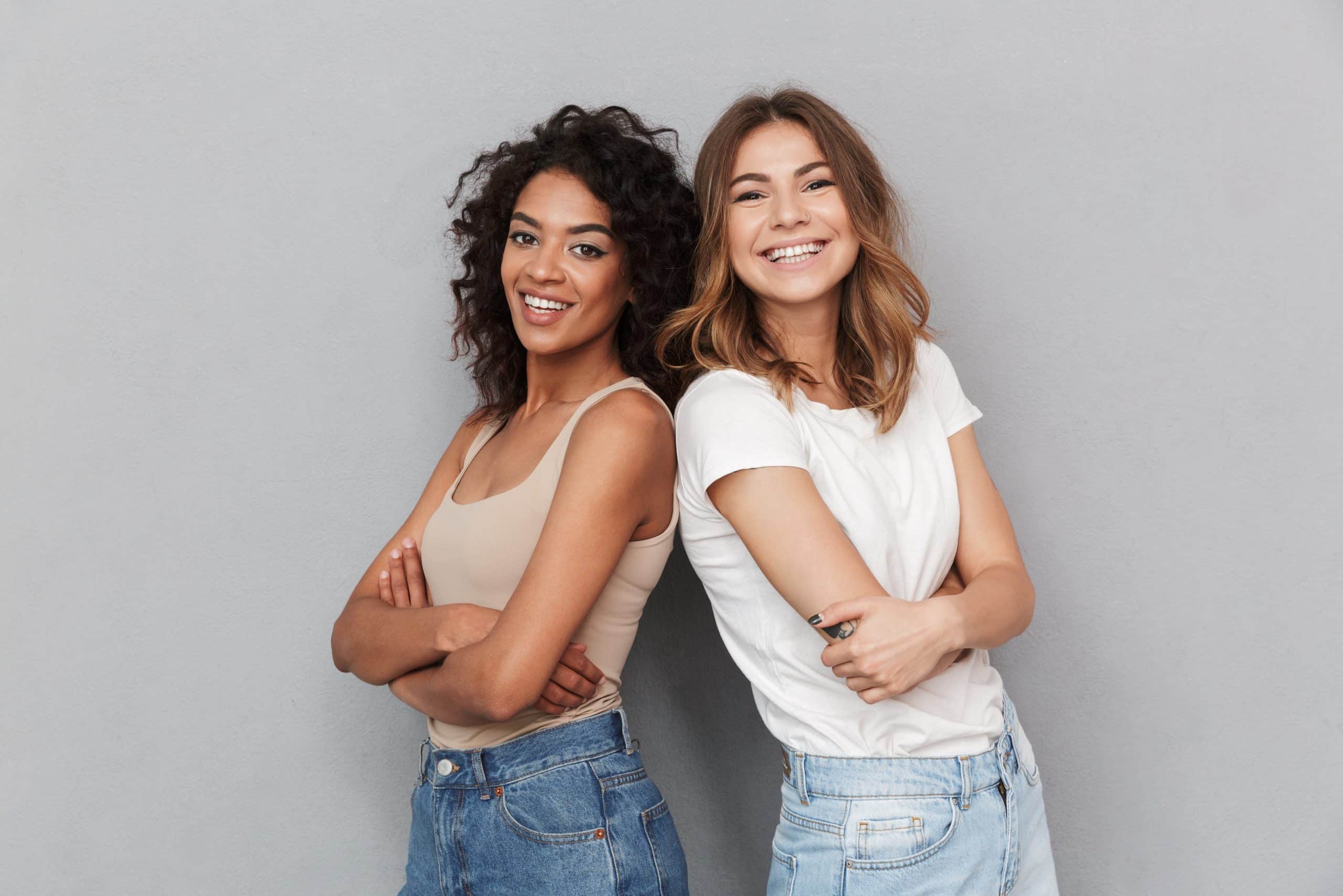 Portrait,Of,Two,Cheerful,Young,Women,Standing,Together,And,Looking Cosmetic dentistry in Auburn. North Auburn Dentistry. General, Cosmetic, Restorative, Family Dentistry Dentist. (530) 392-4132