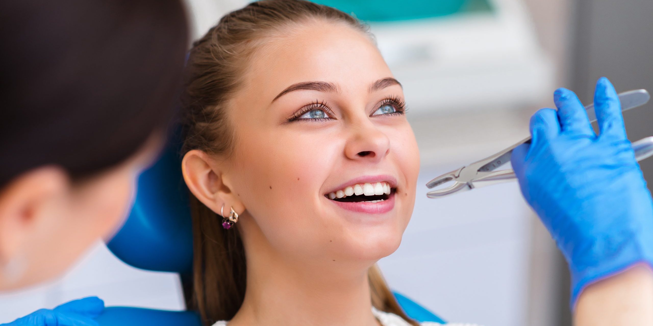 Tooth,Extraction,Beautiful,Girl,In,Dentistry. tooth extractions auburn