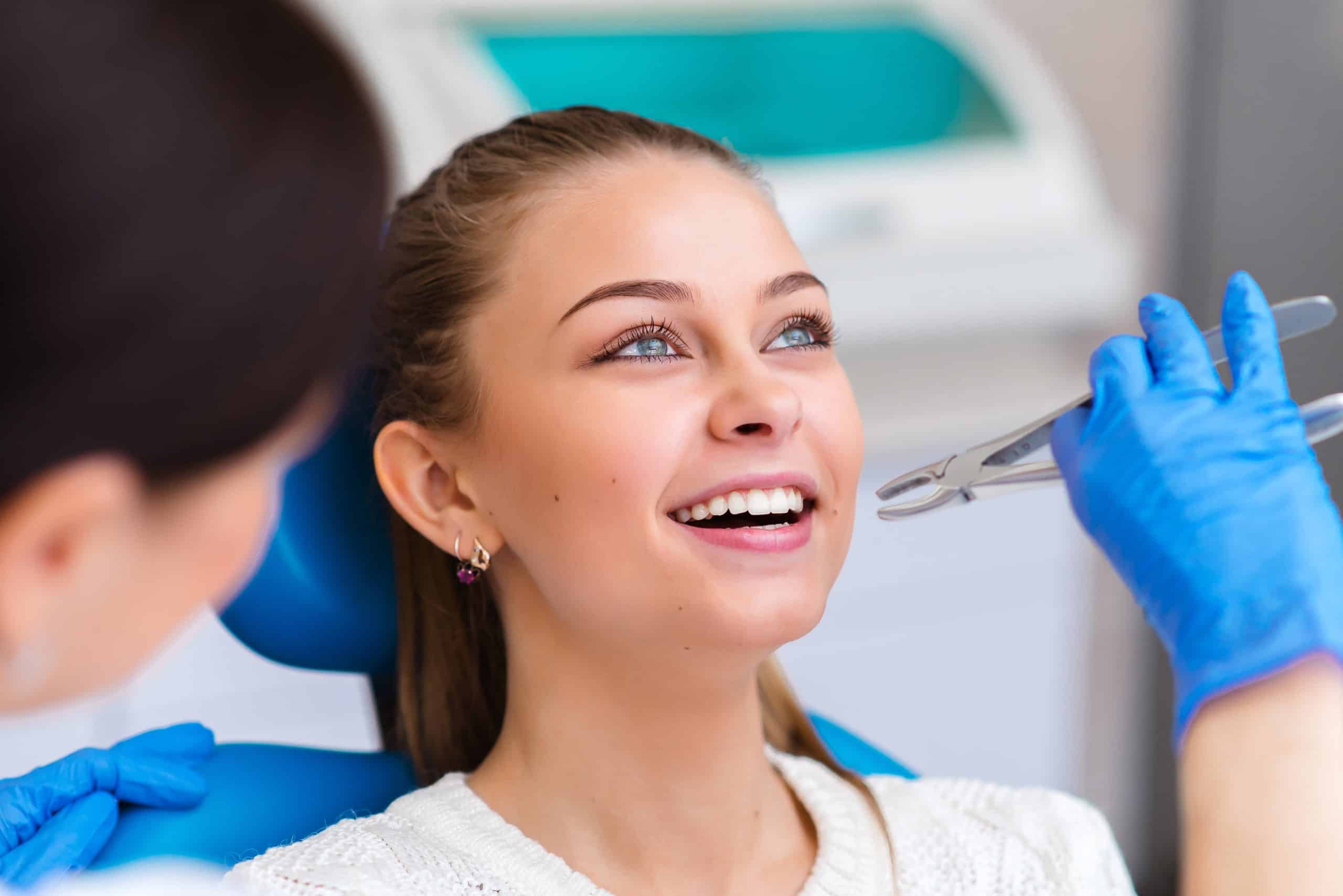 Tooth,Extraction,Beautiful,Girl,In,Dentistry. tooth extractions auburn